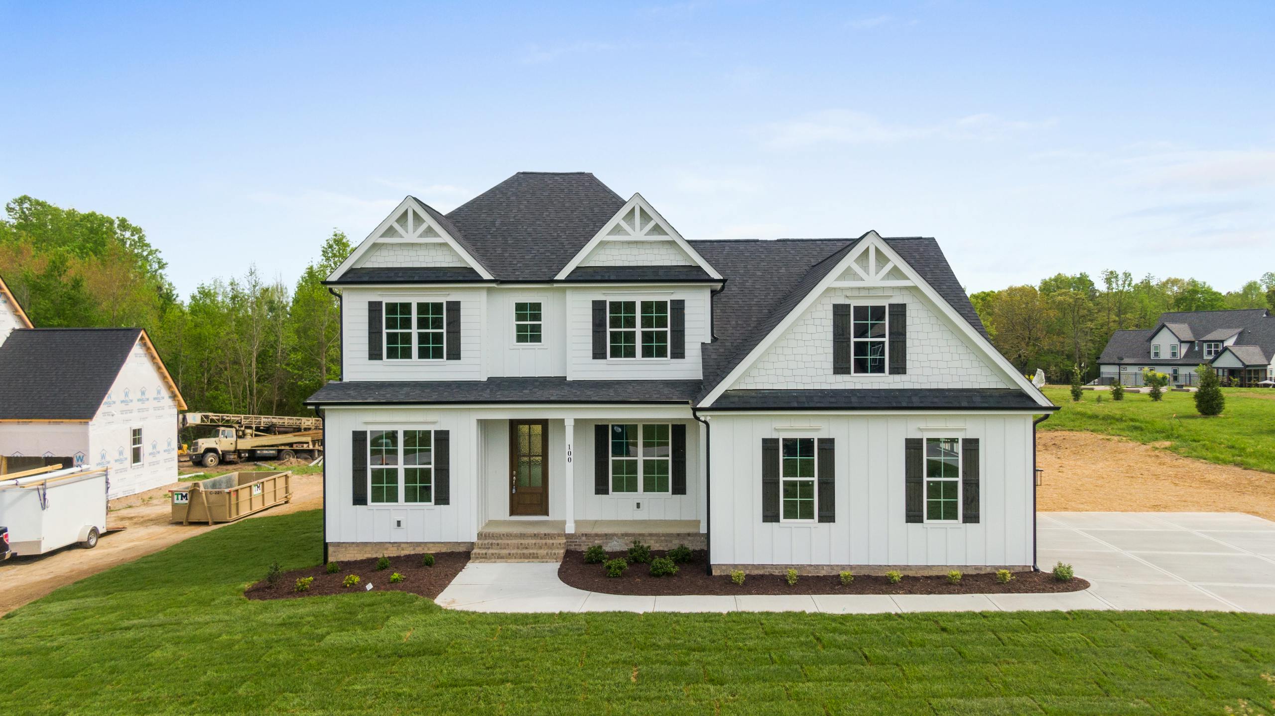 Contemporary suburban home with landscaped lawn, located in Youngsville, NC.